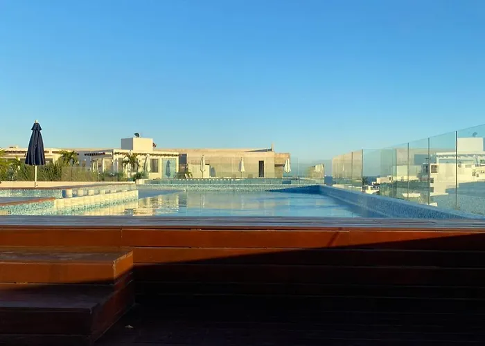Beautiful Roof Top Pool & Gym With Ocean Views!